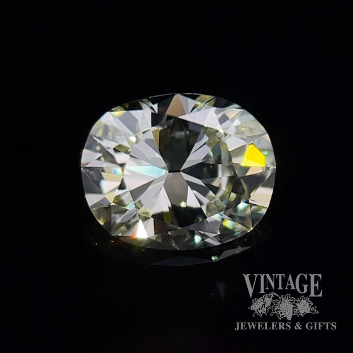 .77 carat, cushion brilliant, U/V color, VS1 clarity, natural diamond