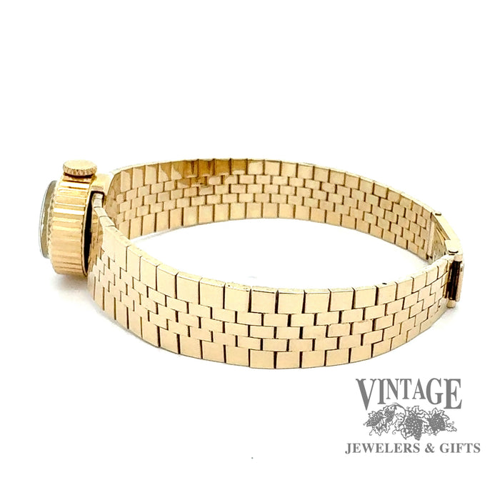 Vintage Ladies slide Rolex 18ky gold watch, side view