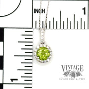 Peridot and diamond 18kw gold pendant scale