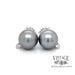 11 mm Black Tahitian pearl and diamond 18k white gold stud earrings.