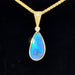 Black opal and diamond 14k gold pendant