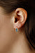 14 karat yellow gold oval 8x6mm blue topaz lever back pierced drop earrings on model