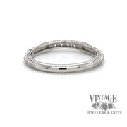 Platinum and diamond hand engraved ring band bottom