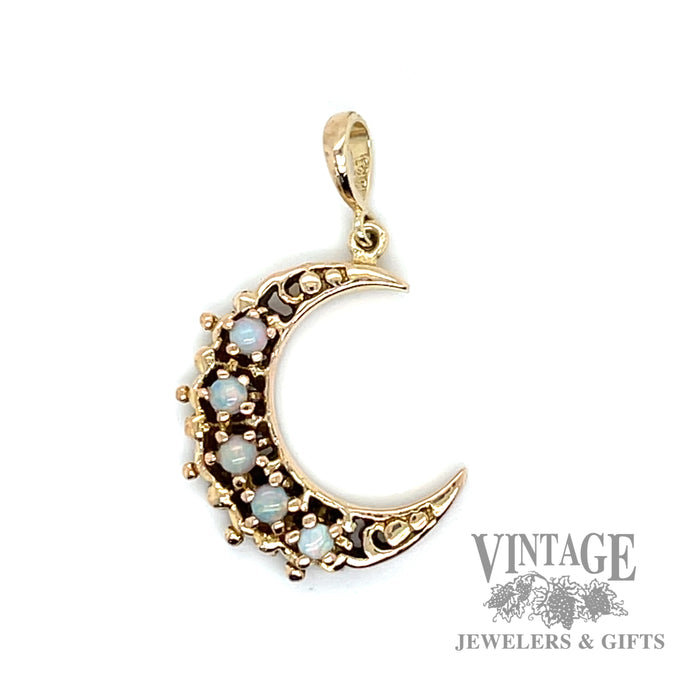 Crescent shaped 14k gold and opal pendant