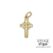 Small embossed 14k gold cross pendant