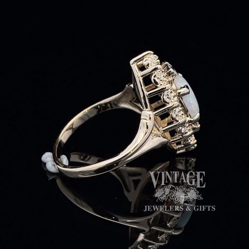 14 karat yellow gold natural opal and diamond navette ring, side view