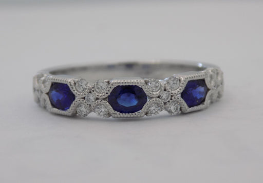 14kw gold .74ct Sapphire and diamond band ring