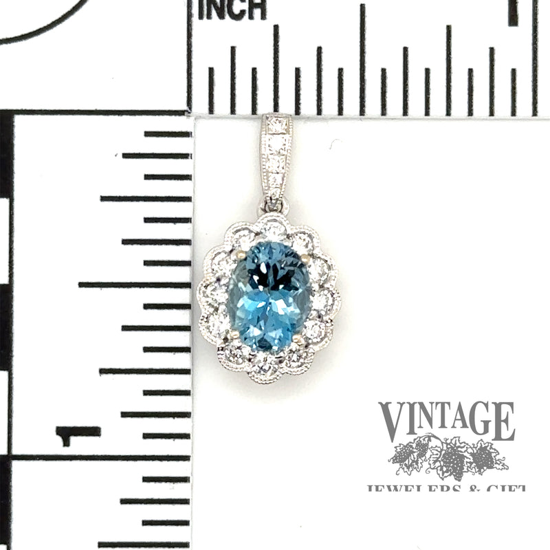 Aquamarine and diamond oval 18kw gold pendant scale