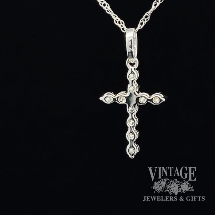 Diamond and 14kw gold “bubble” style cross necklaceback