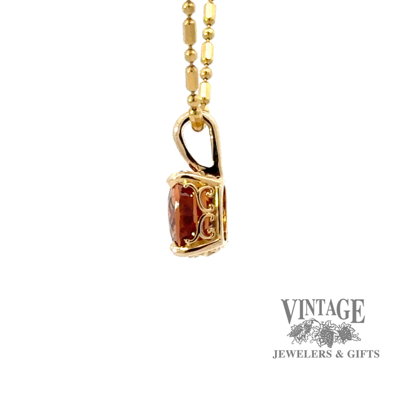 14 karat yellow gold 2.25ct orange hessonite garnet pendant, side view