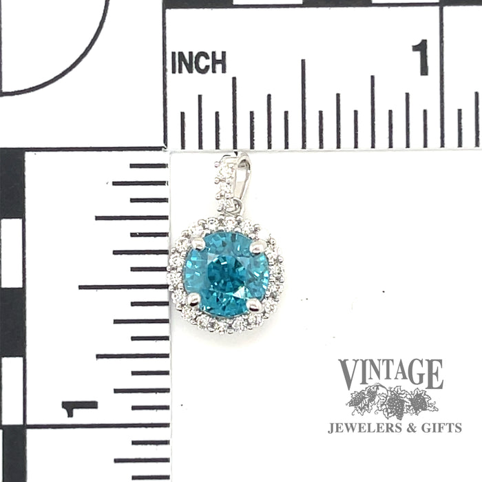 3.87 ct. natural blue zircon and diamond 18kw gold pendant scale