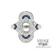 Elongated oval diamond and caliber cut sappire 14kw gold ring