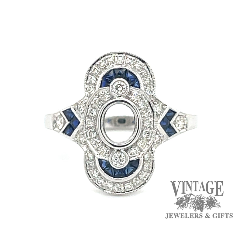 Elongated oval diamond and caliber cut sappire 14kw gold ring