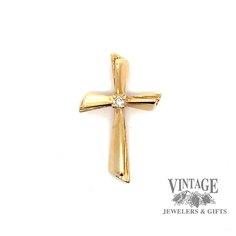 Modern 14 karat yellow gold and diamond estate cross