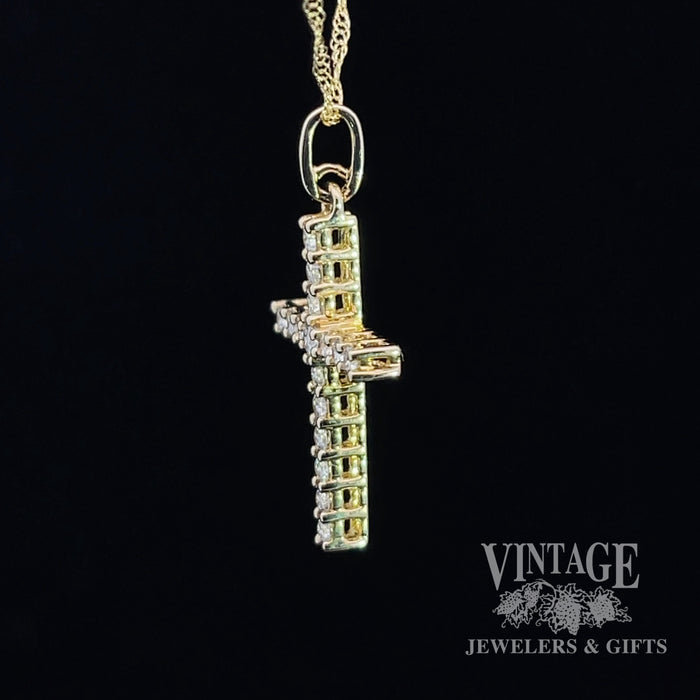 Diamond cross necklace in 14k yellow gold angle
