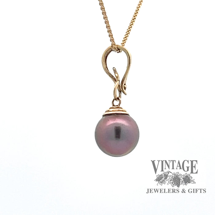 14k hinged pendant with purple/grey pearl side