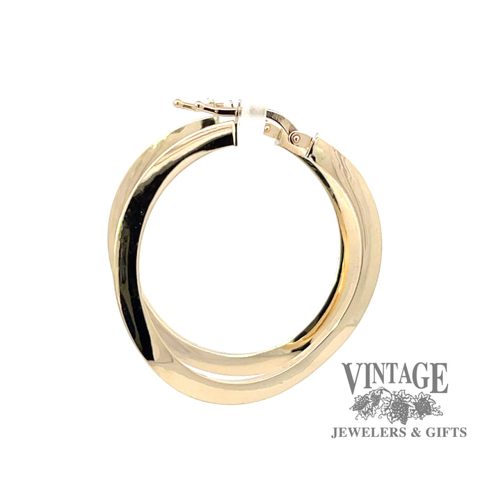 Curved 14ky gold hoop earrings side