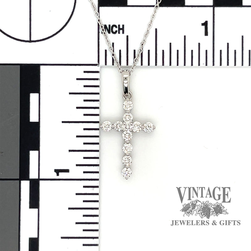Diamond 14KW gold cross necklace scale