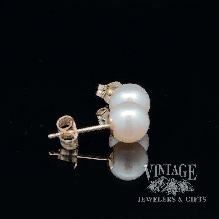 14 karat yellow gold 6.5 mm cultured white pearl pierced stud earrings, side