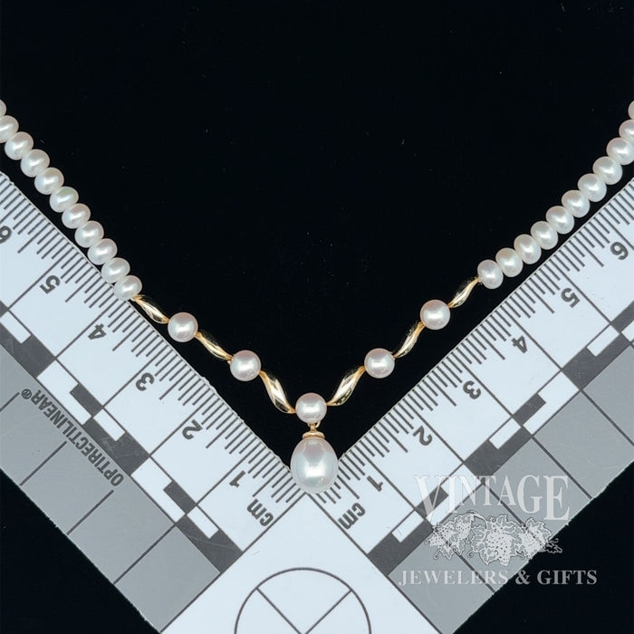 Fresh water cultured pearl drop necklace with 14 karat yellow gold centerpiece, shown with measurements