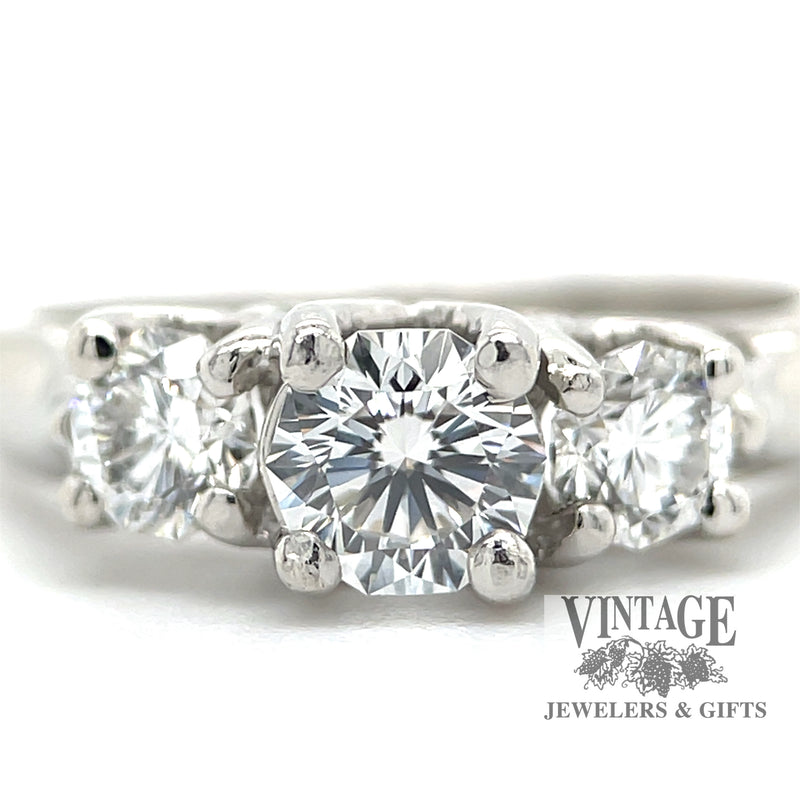 Three stone diamond decagon brilliant cut platinum ring