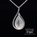 Teardrop shaped natural diamond pave 14KW gold pendant back