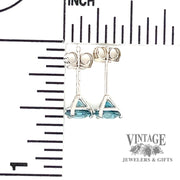 1.54 CTW Blue zircon 5mm round 14KW gold martini stud earrings scale