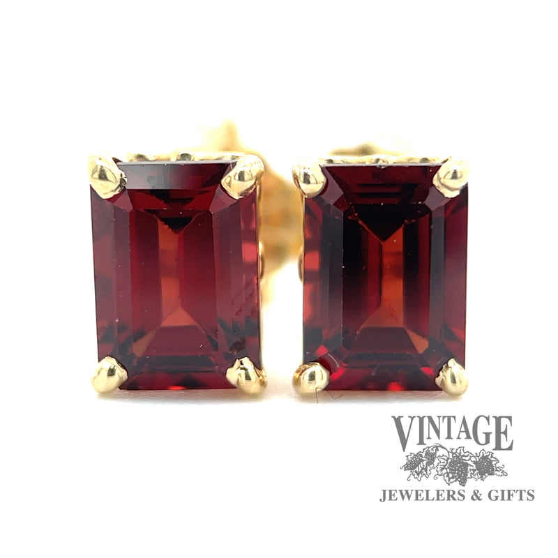 Garnet 14ky gold emerald cut stud earrings