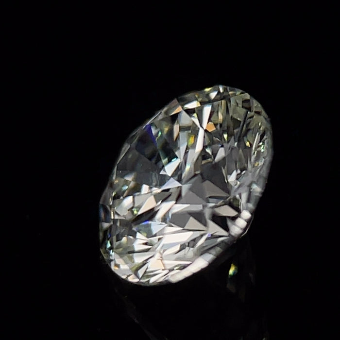 .99 carat, round brilliant, H color, SI2 clarity, natural diamond.