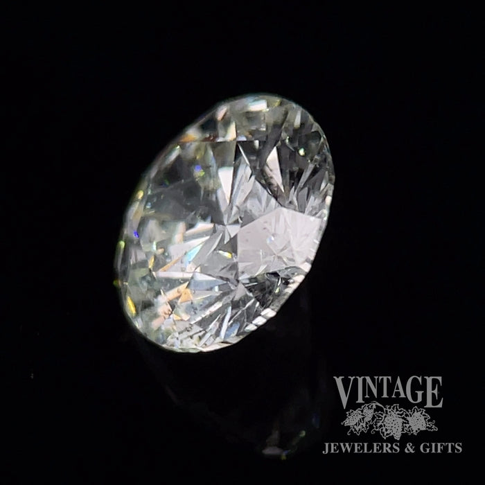 1.22 carat, J color, I2 clarity, round brilliant, natural diamond