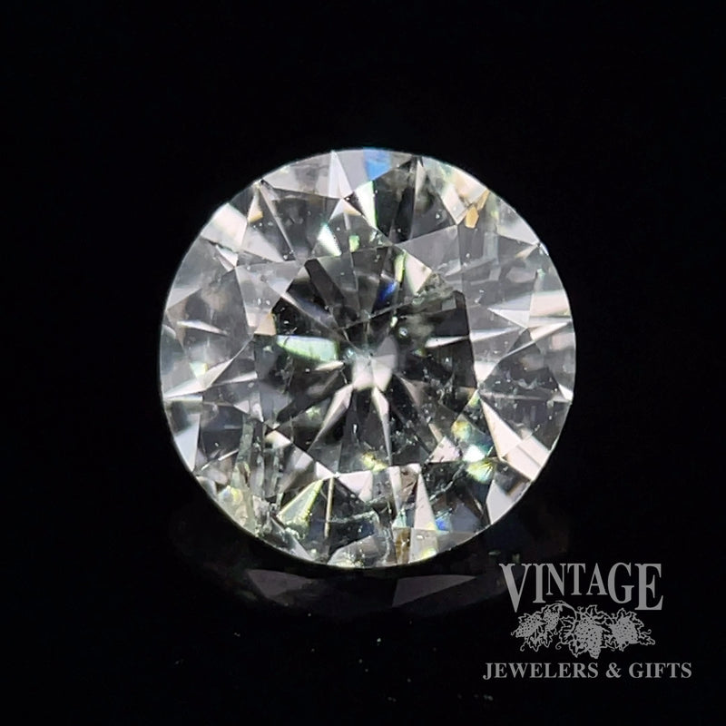 1.22 carat, J color, I2 clarity, round brilliant, natural diamond