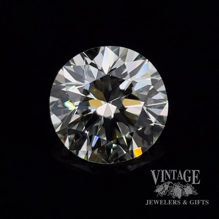 1.13 carat, round brilliant, M color, VS1 clarity, natural diamond, GIA graded