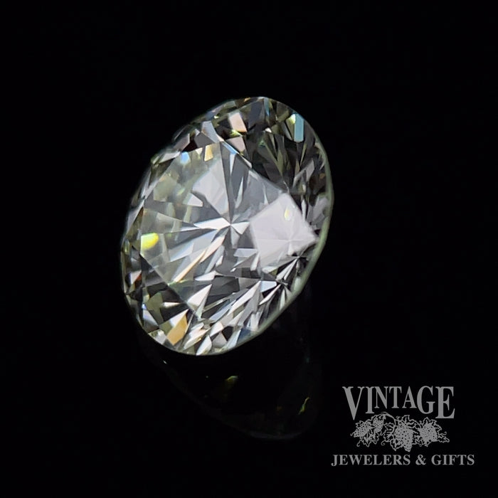 1.13 carat, round brilliant, M color, VS1 clarity, natural diamond, GIA graded