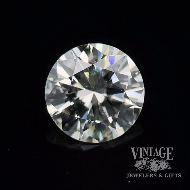 1.10 carat, round brilliant, J color, SI1 clarity, natural diamond, GIA graded