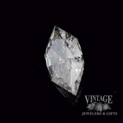 .73 elongated hexagonal, J color, SI1 clarity natural diamond side