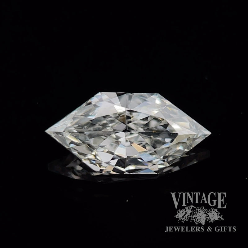 .73 elongated hexagonal, J color, SI1 clarity natural diamond top