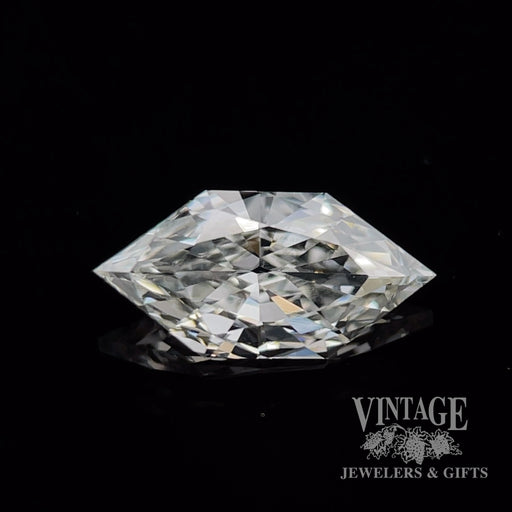 .73 elongated hexagonal, J color, SI1 clarity natural diamond top