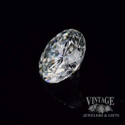 .63 carat, Round brilliant, D color, SI1 clarity, natural diamond side