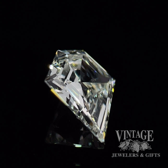 .74 carat, Shield shaped, G color, VS2 clarity, natural diamond side