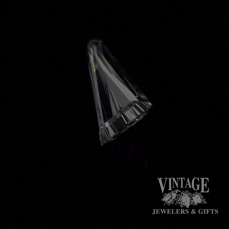 .57 carat, shield shaped, E color, VS2 clarity, natural diamond side