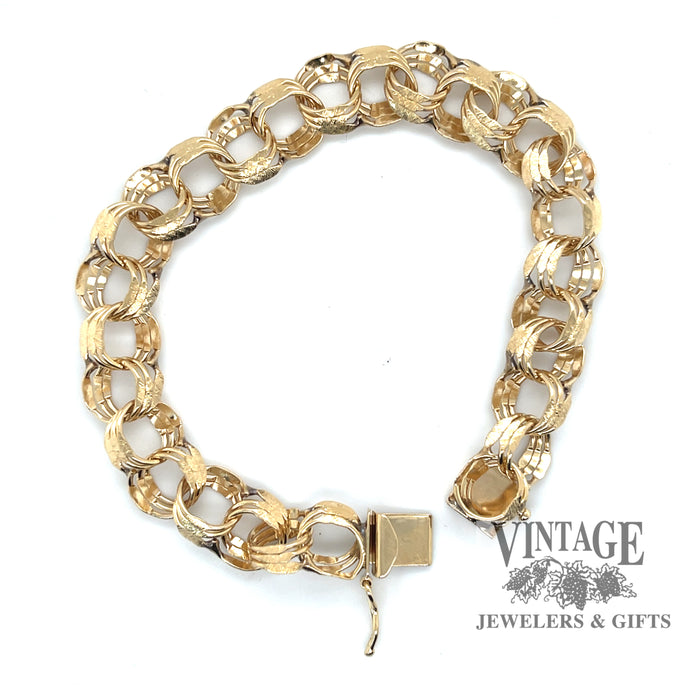 7.5” vintage 14ky gold 10mm charm bracelet