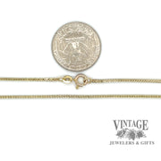 18” 14ky gold 1.25 mm wheat box chain necklace scale.