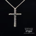 Diamond and 14k white gold cross necklace back.