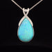 Blue/green opal 14k white gold and diamond pendant