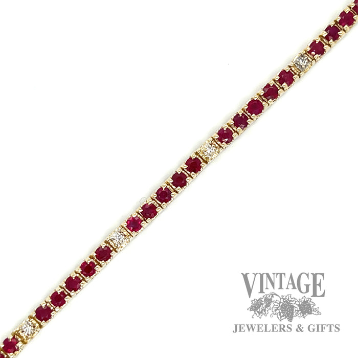 Natural ruby and diamond 14ky gold line bracelet.