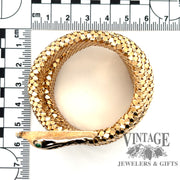 18 karat yellow gold "coiled" Snake arm wrap bracelet, shown with measurements
