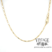 14 karat yellow gold 25” alternating round/oval bead chain