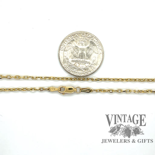 20” 14 karat yellow gold 2.1mm solid cable link chain, shown with quarter for size reference