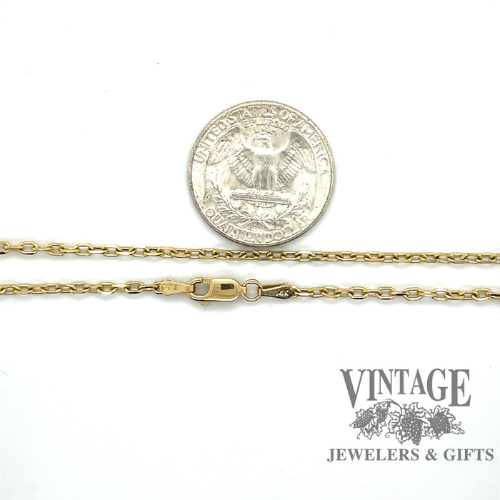 14 karat yellow gold 2.2 mm 20" solid round diamond cut open cable link chain, shown with quarter for size reference
