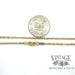 14 karat yellow gold 2.2 mm 20" solid round diamond cut open cable link chain, shown with quarter for size reference